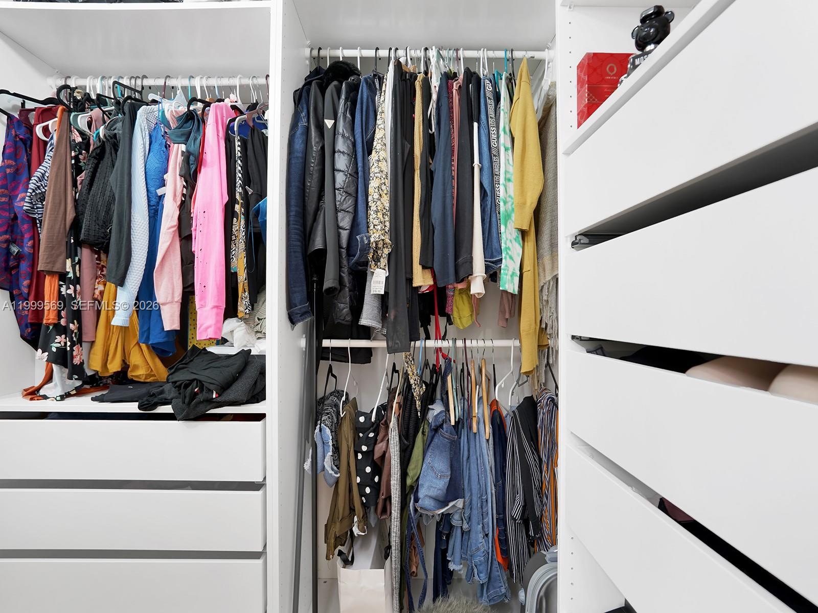 6841 Southwest 147th Avenue, Unit 2H Miami, FL 33193 - Photo 20 of 22 a view of a walk in closet