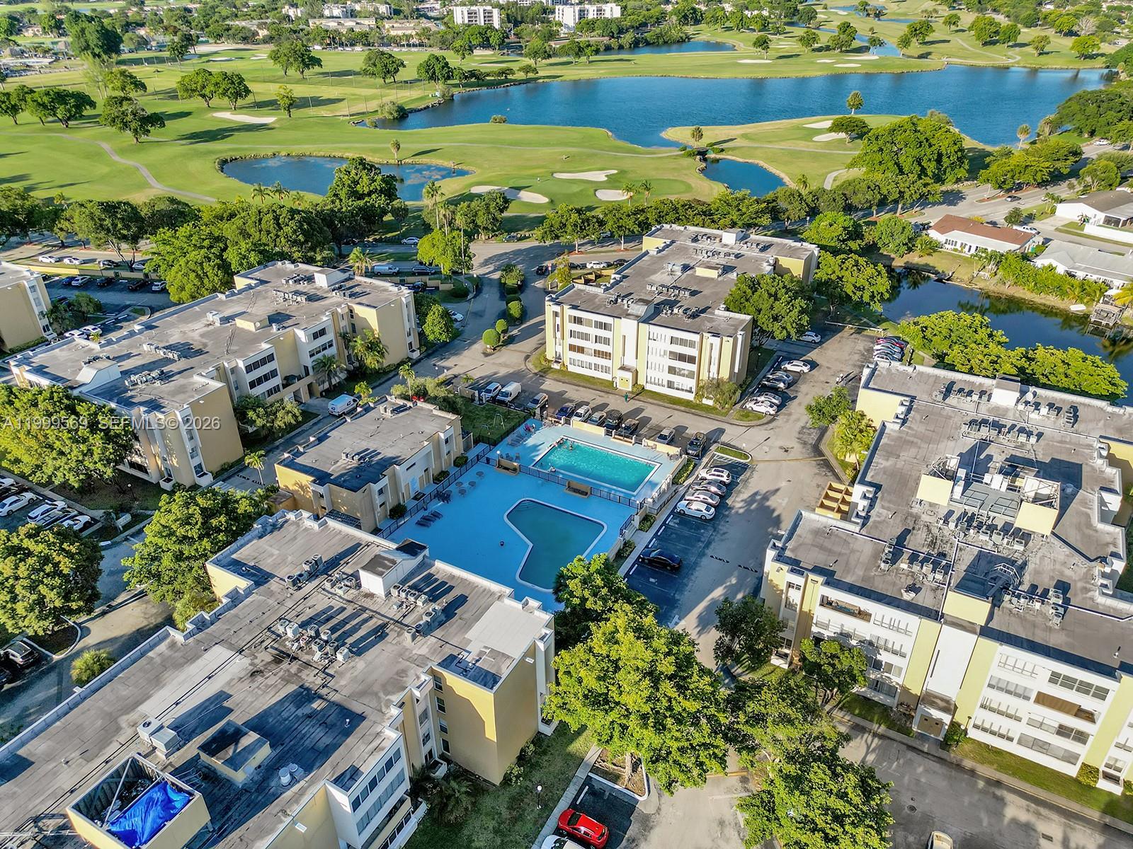 6841 Southwest 147th Avenue, Unit 2H Miami, FL 33193 - Photo 4 of 22 an aerial view of residential houses with outdoor space