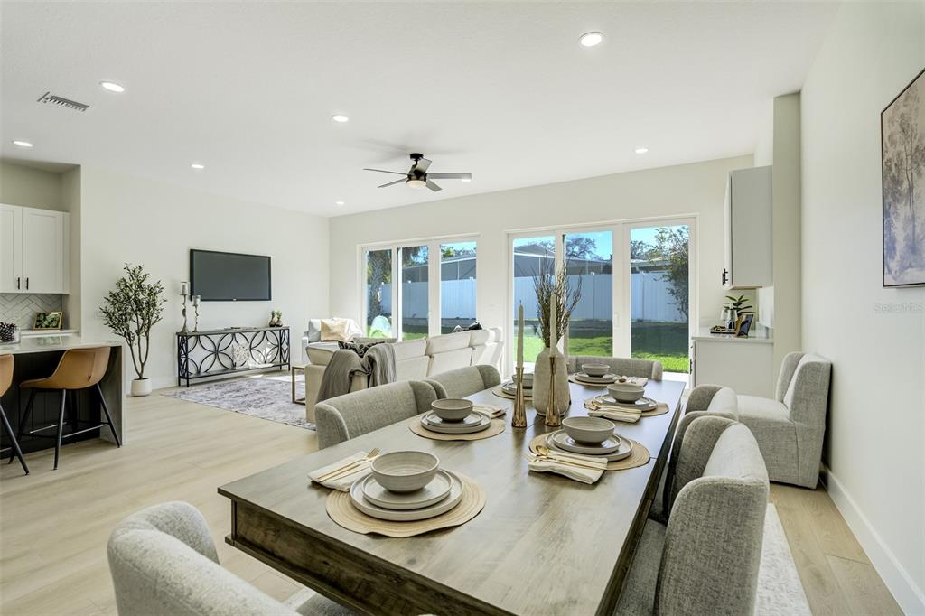 319 Cedar Lane Largo, FL 33770 - Photo 15 of 37 a living room with furniture and large windows