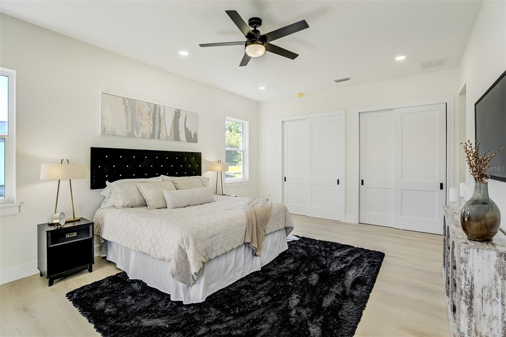 319 Cedar Lane Largo, FL 33770 - Photo 21 of 37 a bedroom with a bed and a window