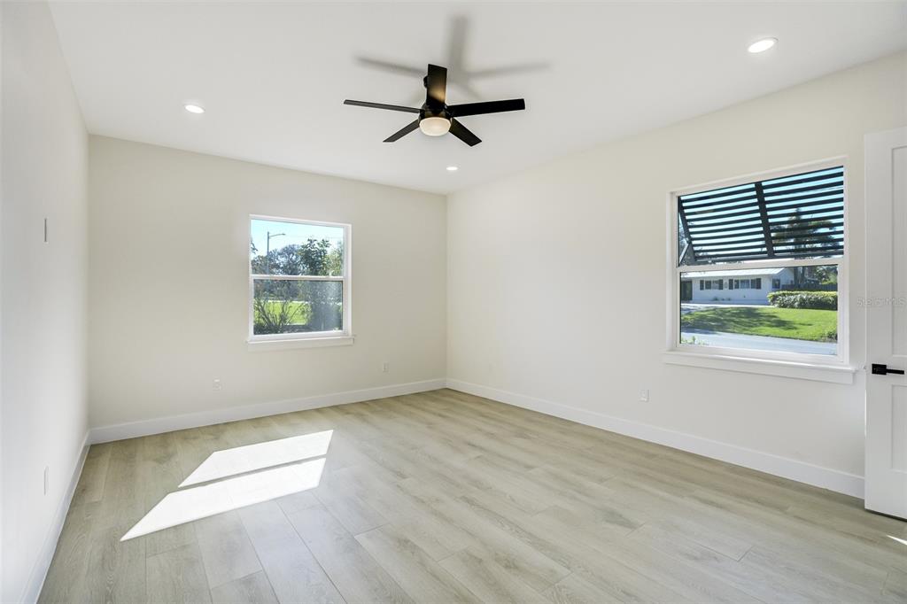 319 Cedar Lane Largo, FL 33770 - Photo 28 of 37 wooden floor in an empty room with a window