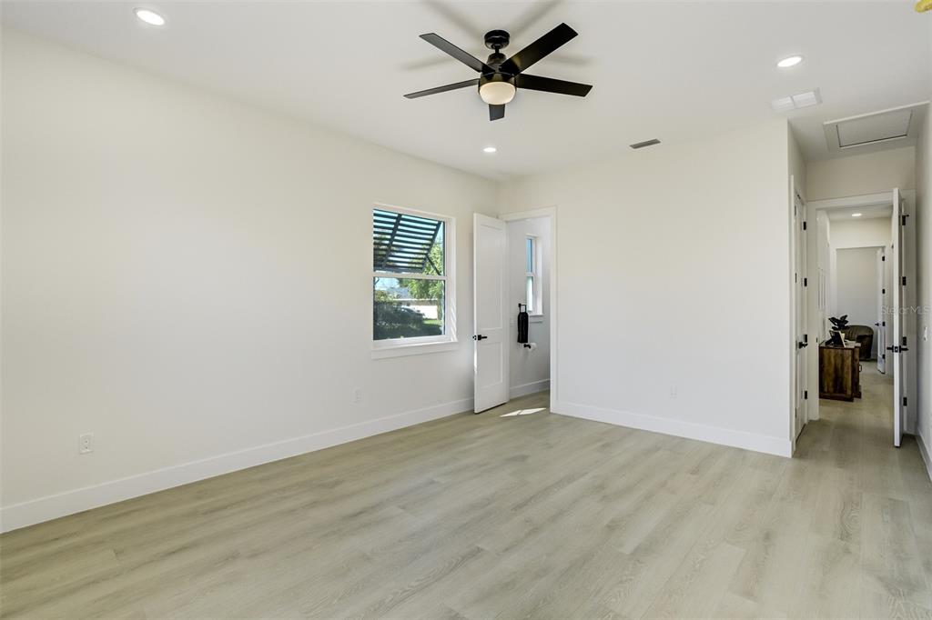 319 Cedar Lane Largo, FL 33770 - Photo 29 of 37 wooden floor in an empty room with a window