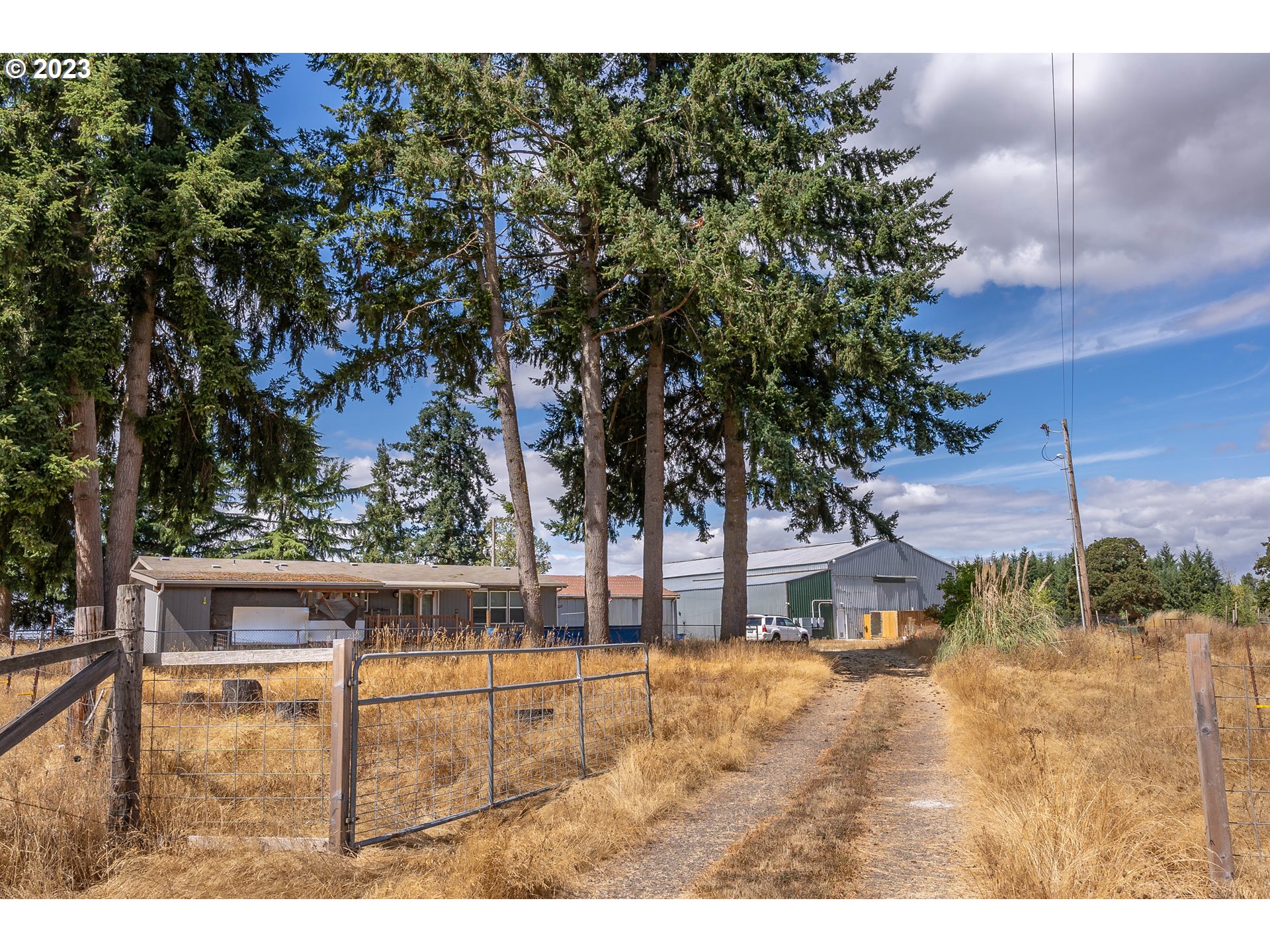 33778 Bond Road Lebanon, OR 97355 - Photo 3 of 12 a view of outdoor space with trees