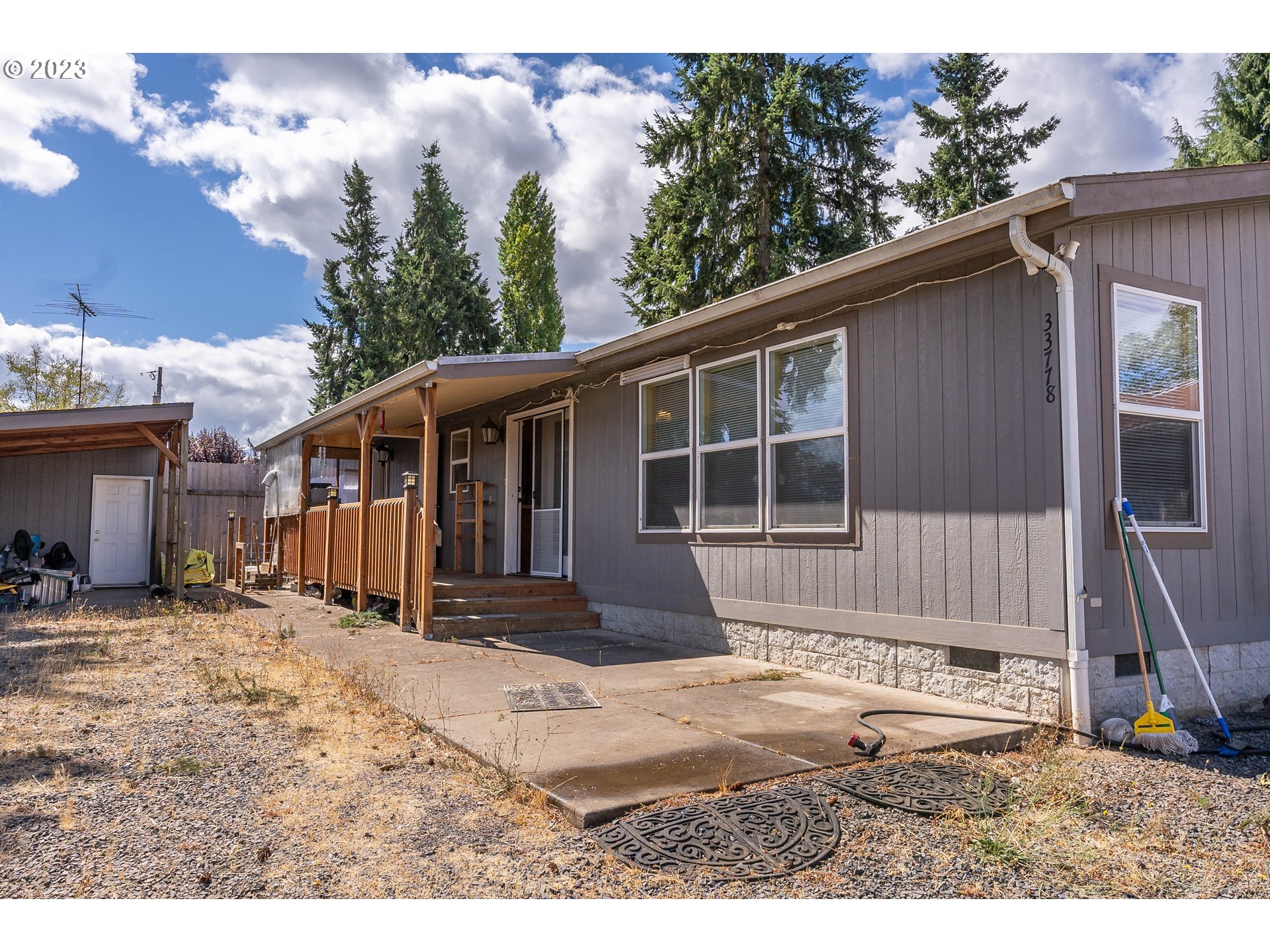 33778 Bond Road Lebanon, OR 97355 - Photo 4 of 12 a house with trees in the background