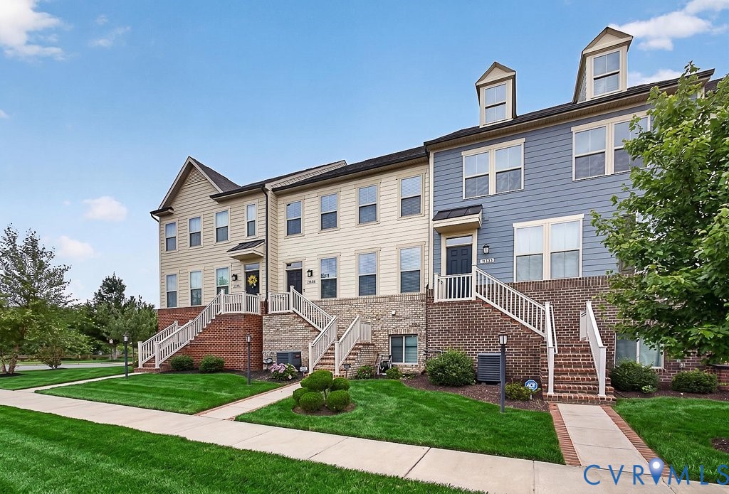 17976 Spotted Oak Road Dumfries, VA 22026 - Photo 4 of 52 Three-story townhomes featuring dormer windows, in