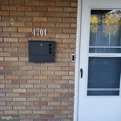 a brick building with a sink