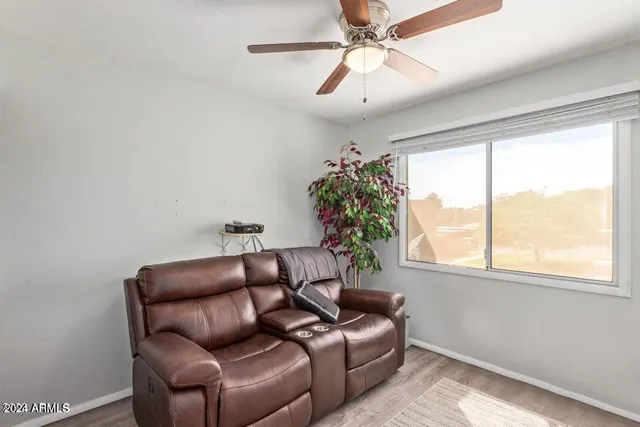 a view of livingroom with hardwood floor and window