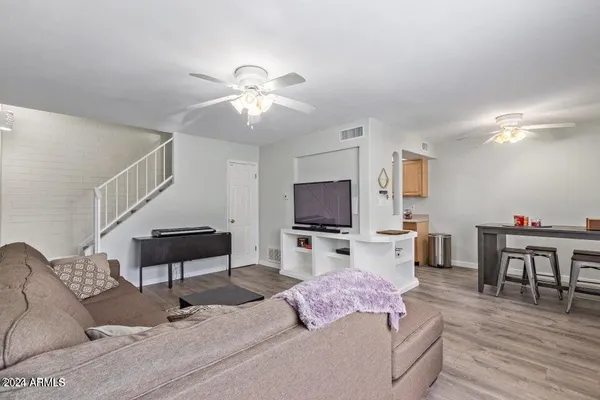 a living room with furniture and a window