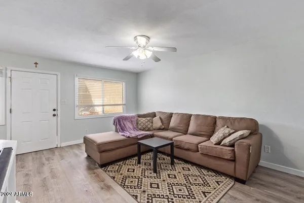 a workspace with furniture and window