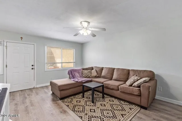 a workspace with furniture and window