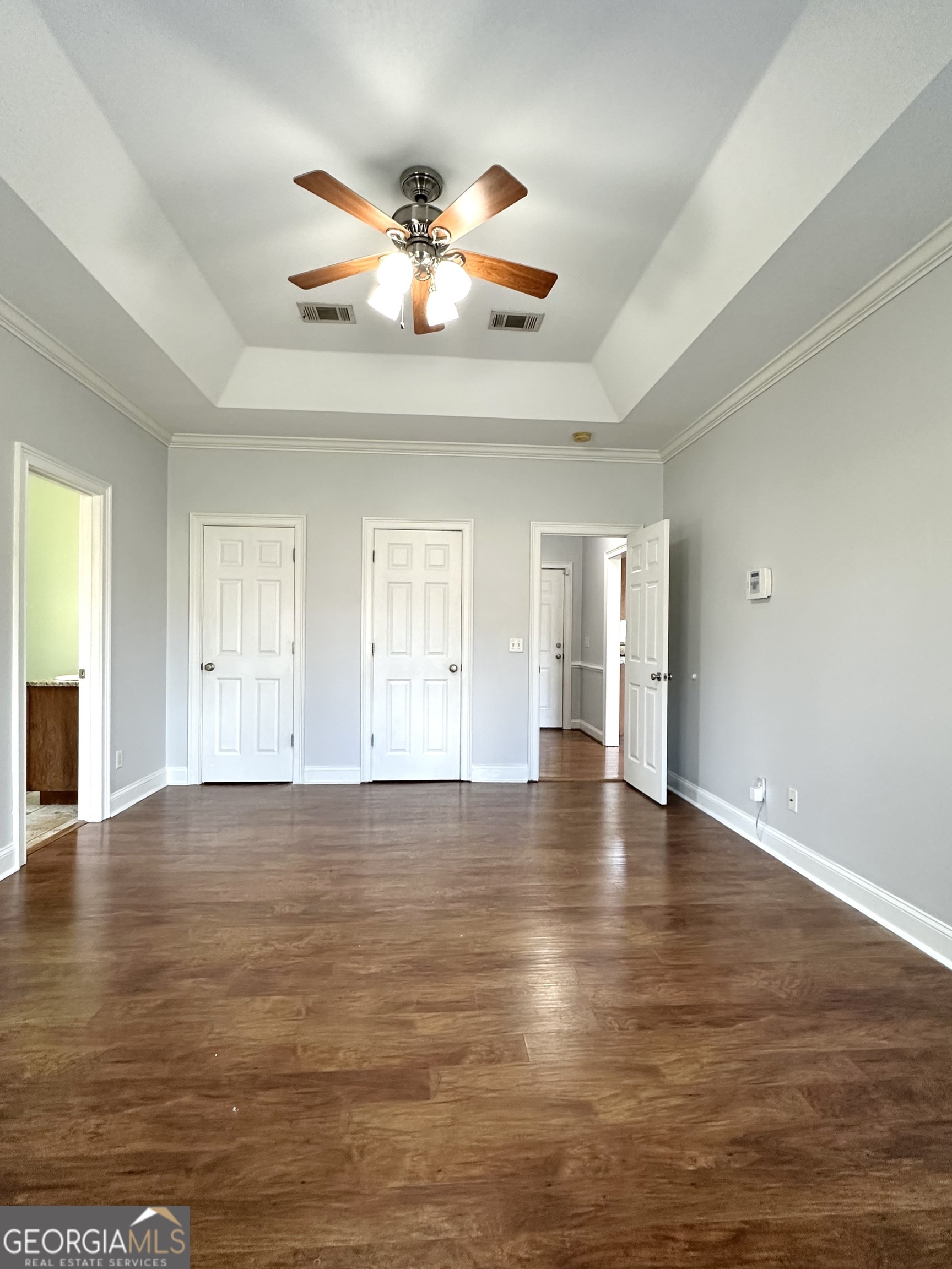 26 Alan Lane Tifton, GA 31793 - Photo 12 of 28 a view of an empty room with wooden floor and a window
