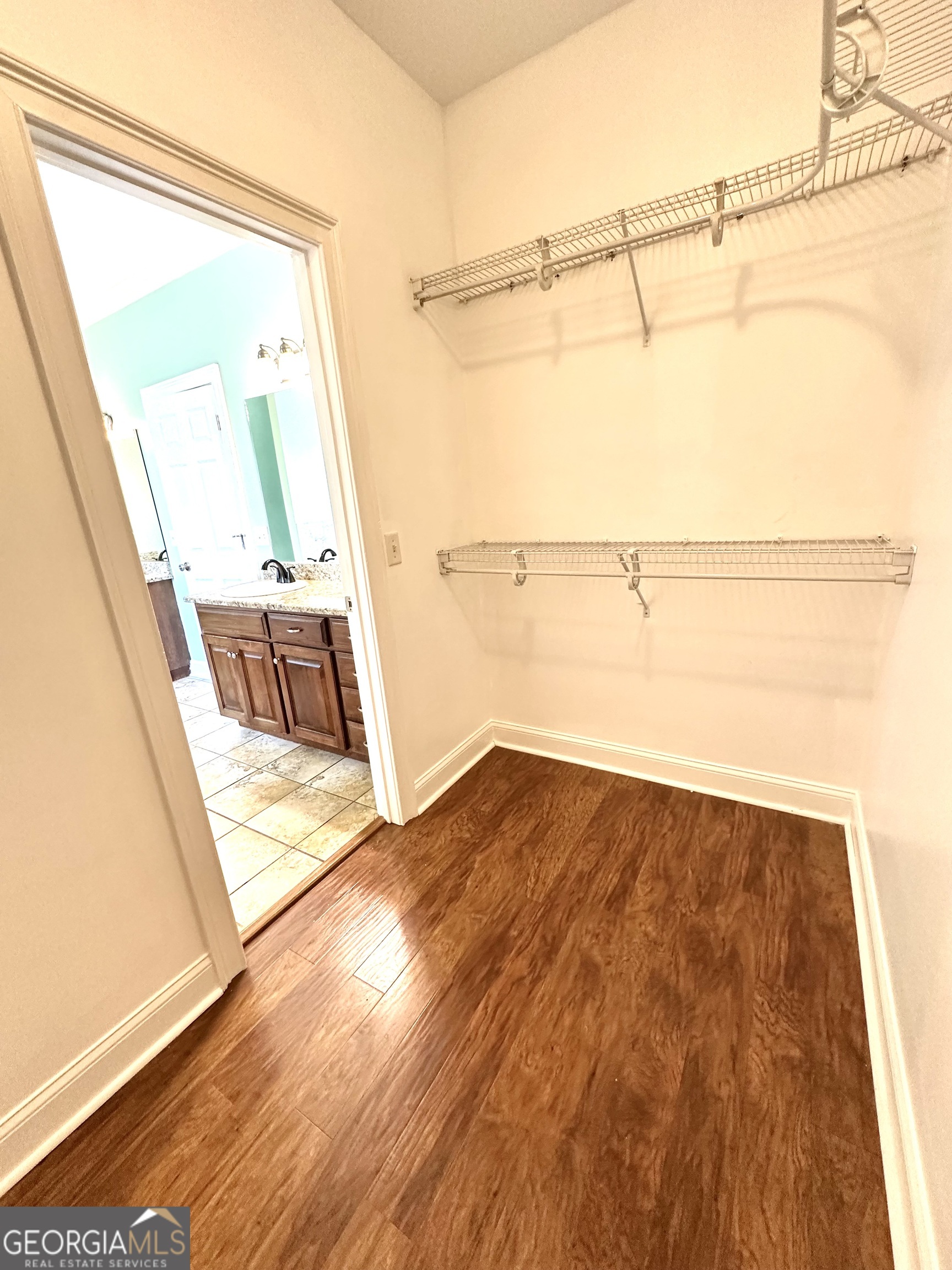 26 Alan Lane Tifton, GA 31793 - Photo 19 of 28 a view of walk in closet with empty racks