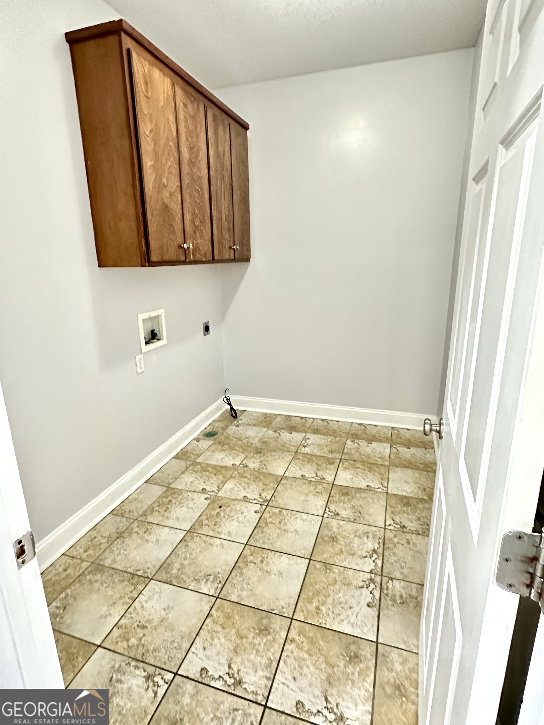 26 Alan Lane Tifton, GA 31793 - Photo 21 of 28 a bathroom with a granite countertop sink and a mirror