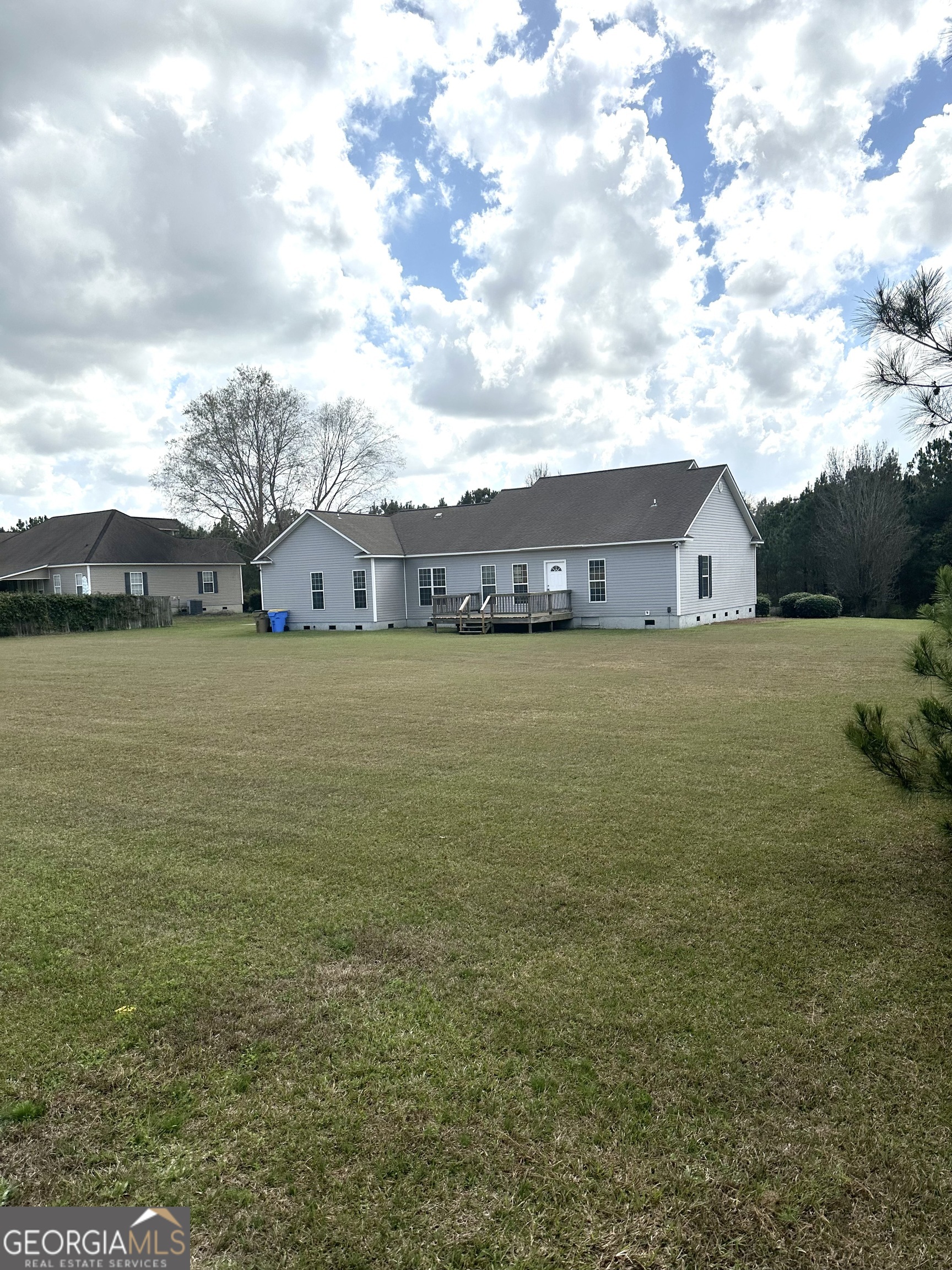 26 Alan Lane Tifton, GA 31793 - Photo 27 of 28 a view of a lake with houses in the back