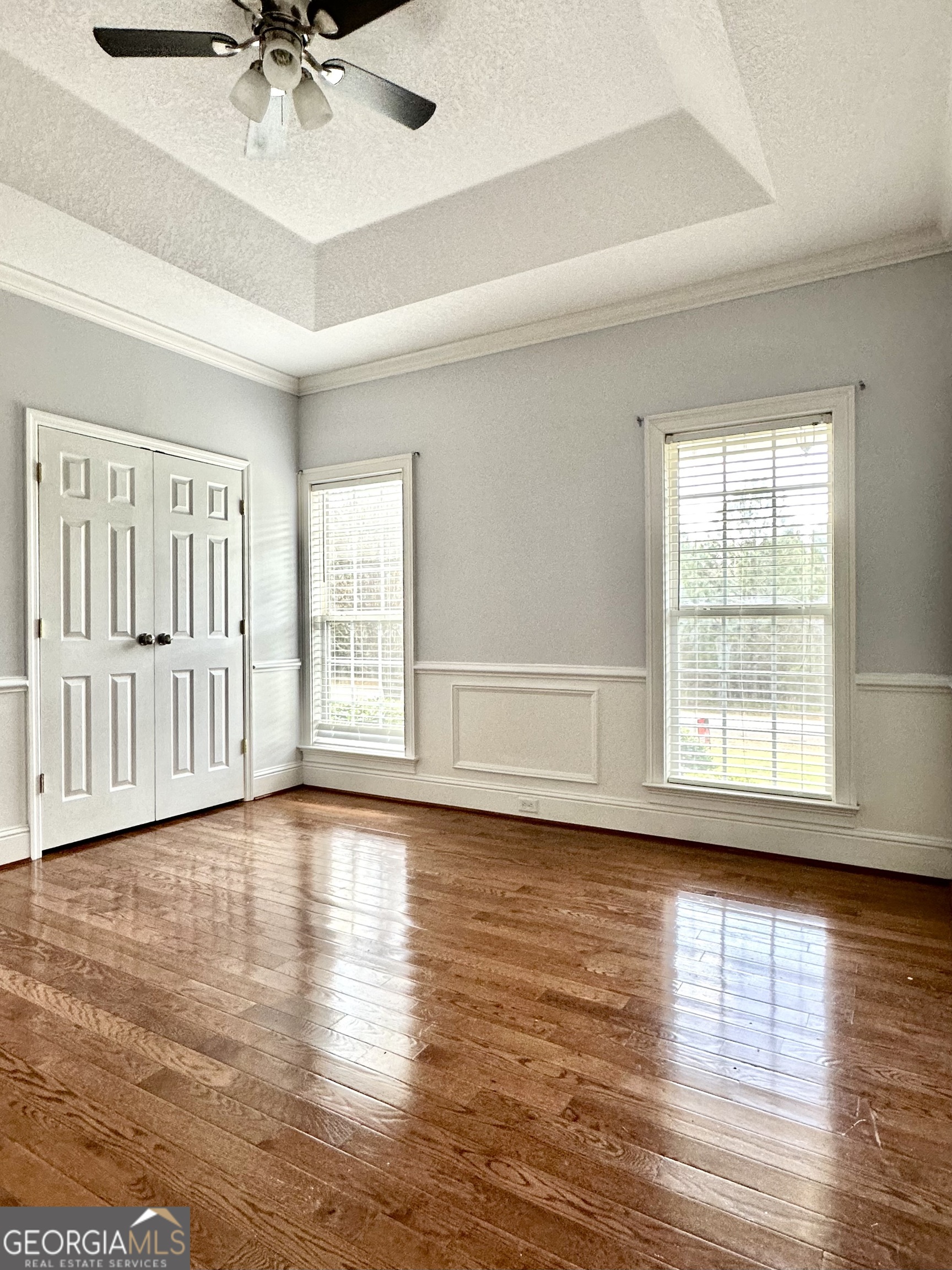 26 Alan Lane Tifton, GA 31793 - Photo 10 of 28 a view of an empty room with a window and wooden floor