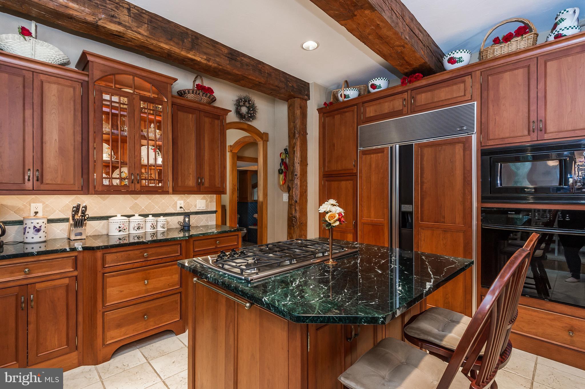 4137 Grave Run Road Manchester, MD 21102 - Photo 4 of 30 a kitchen with stainless steel appliances granite countertop a stove and a sink