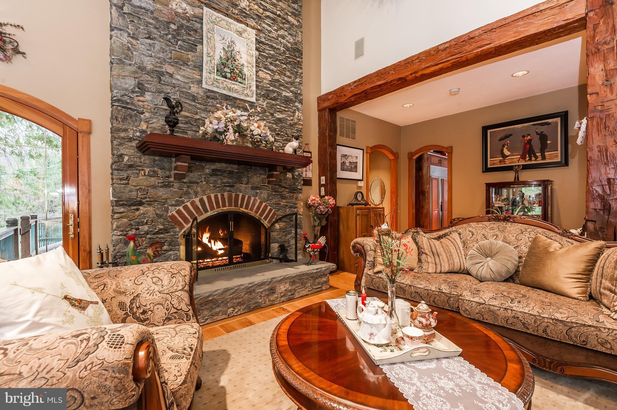 4137 Grave Run Road Manchester, MD 21102 - Photo 7 of 30 a living room with furniture and a fireplace