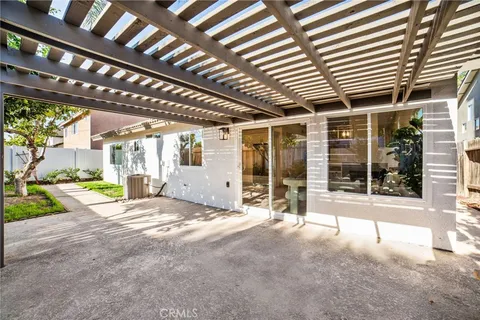 a view of a house with porch and sitting area
