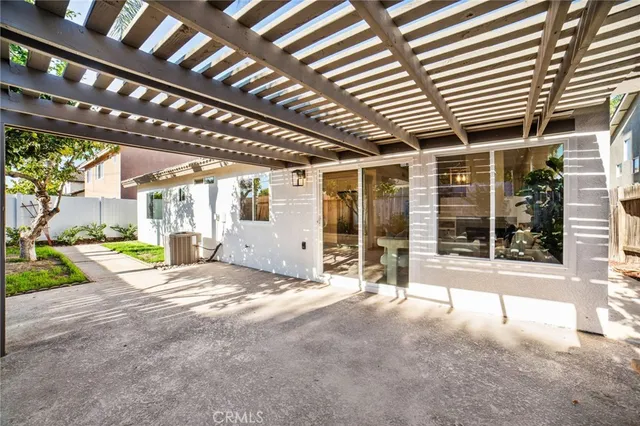 a view of a house with porch and sitting area