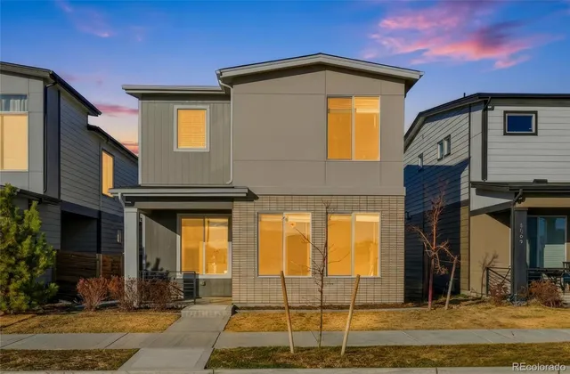 a view of a terrace with a table and chairs