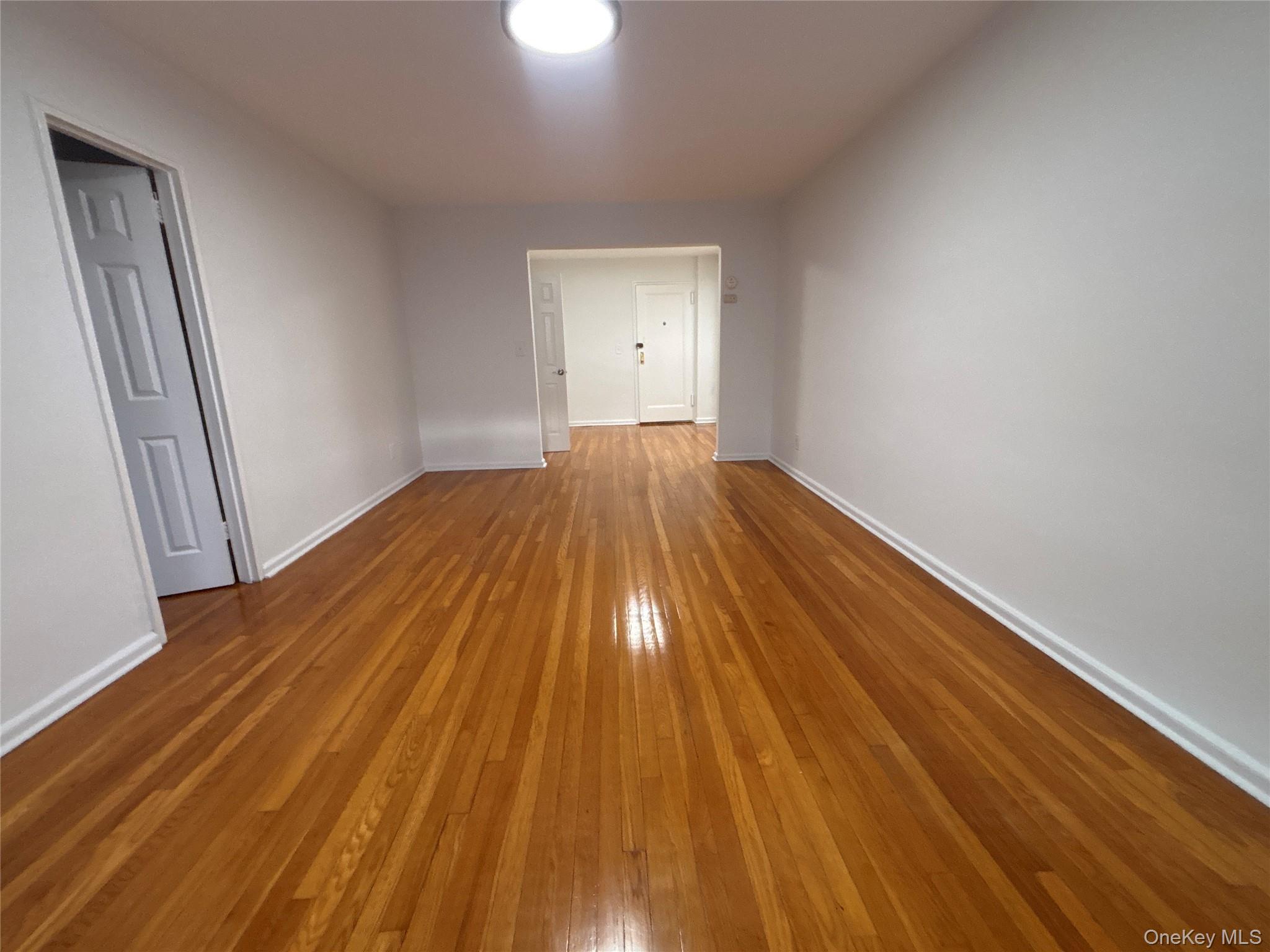 50 South Middle Neck Road, Unit 2L Great Neck, NY 11021 - Photo 10 of 12 a view of wooden floor in a room