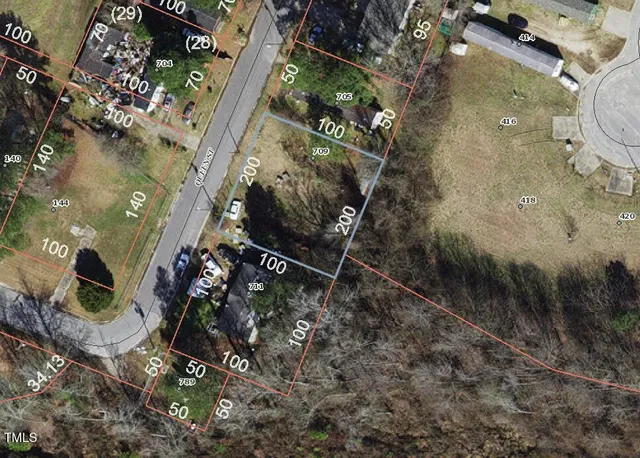 a aerial view of a house with a yard