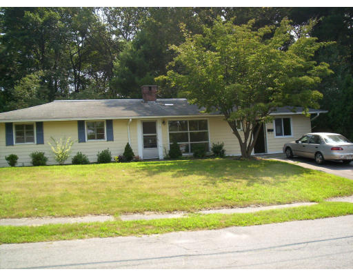 79 Rindone Street Holbrook, MA 02343 - Photo 1 of 10 a front view of a house with a yard