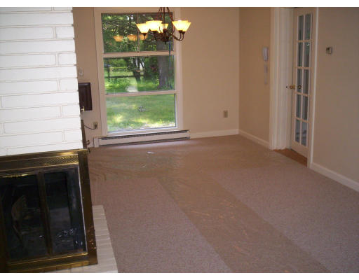 79 Rindone Street Holbrook, MA 02343 - Photo 3 of 10 a view of empty room with window