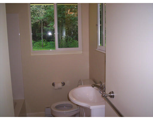 79 Rindone Street Holbrook, MA 02343 - Photo 6 of 10 a bathroom with a sink and toilet