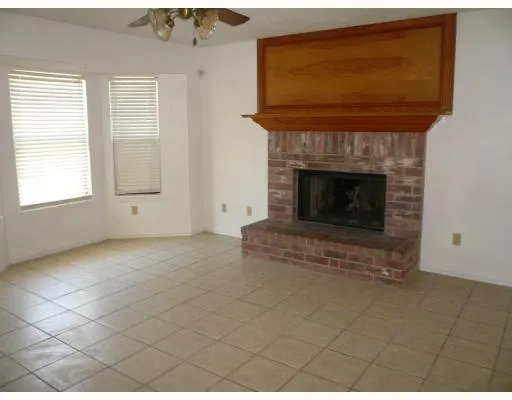 a living room with a fireplace