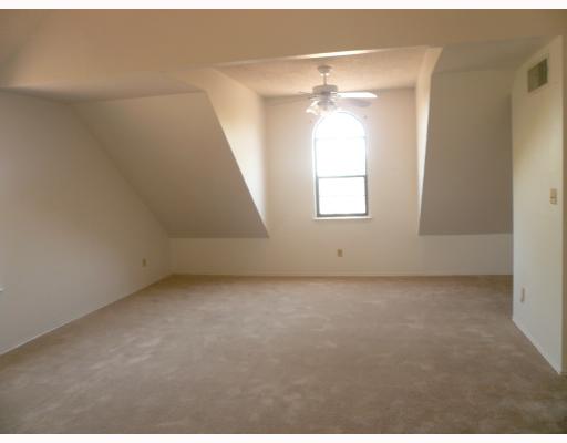 4349 Aaron Drive Corpus Christi, TX 78413 - Photo 5 of 10 an empty room with windows and fan