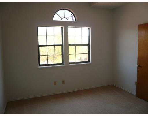 4349 Aaron Drive Corpus Christi, TX 78413 - Photo 7 of 10 an empty room with a window