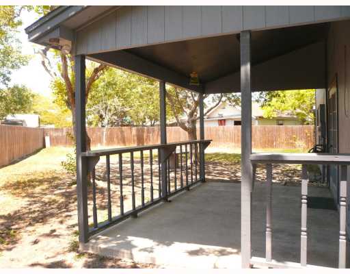 4349 Aaron Drive Corpus Christi, TX 78413 - Photo 9 of 10 a view of a porch with a floor to ceiling window