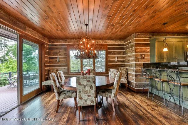 a kitchen with stainless steel appliances granite countertop a stove and a refrigerator
