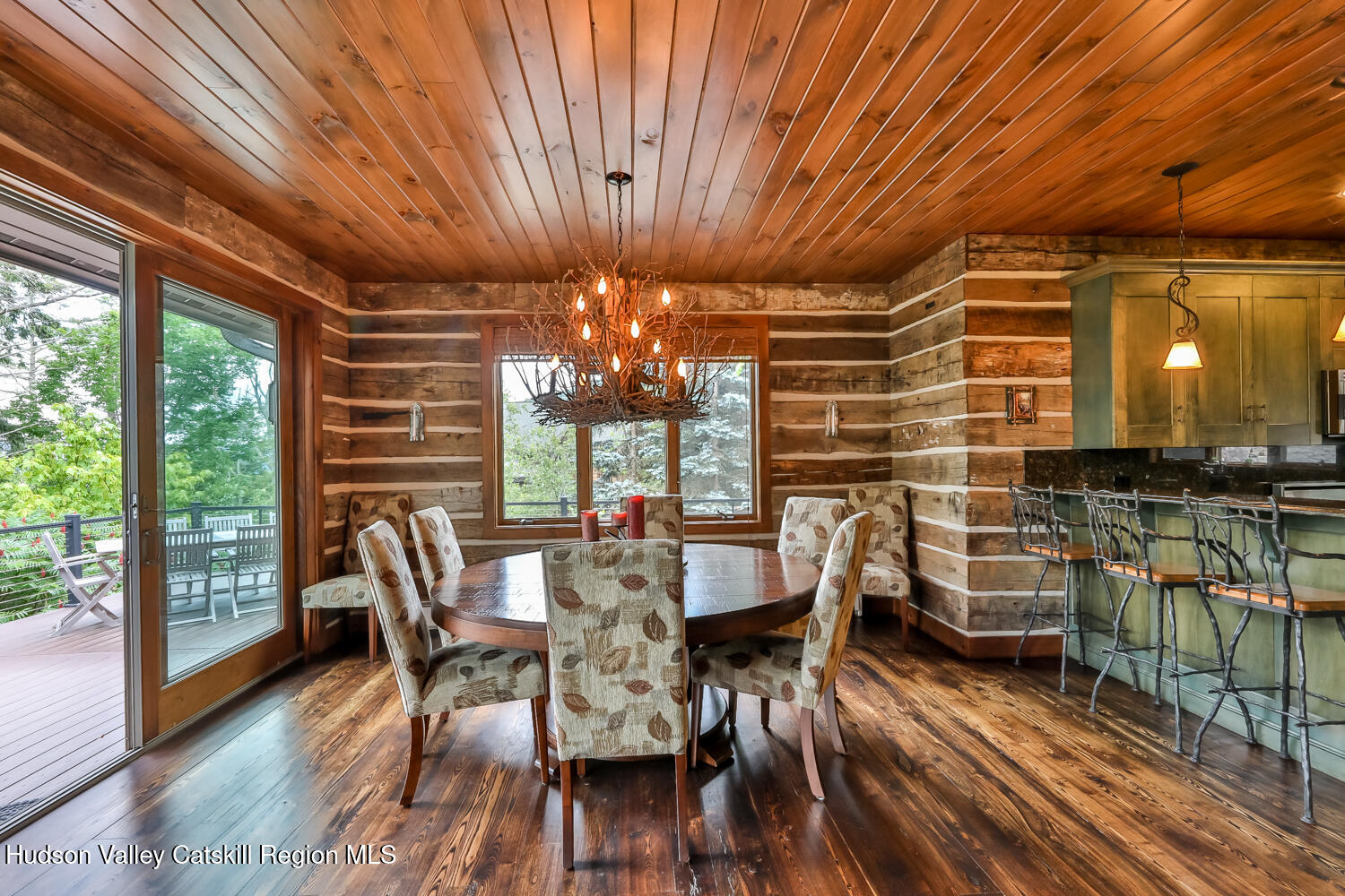 22 Club Road Windham, NY 12496 - Photo 15 of 41 a view of a dining room with furniture window and outside view