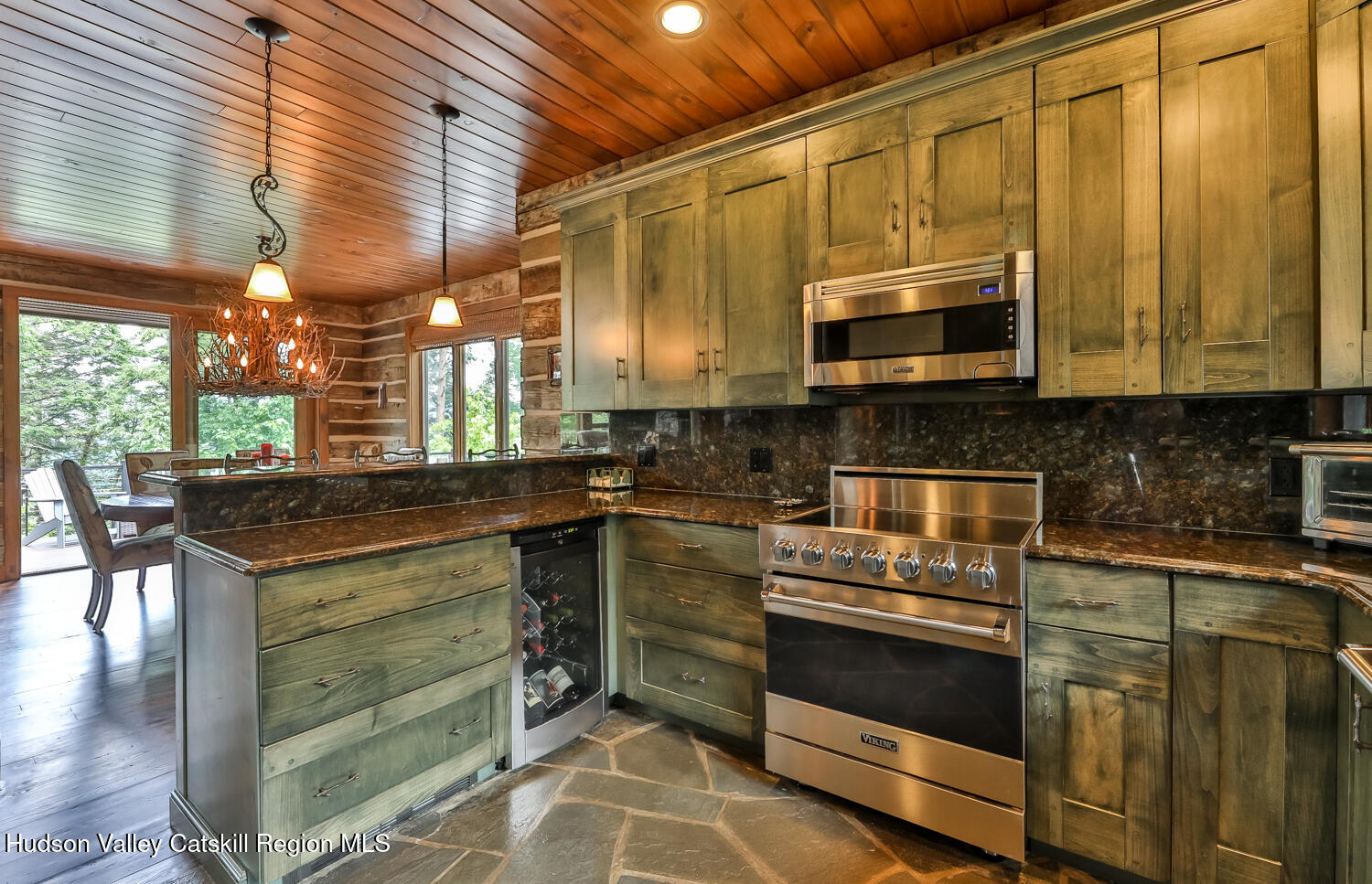 22 Club Road Windham, NY 12496 - Photo 20 of 41 a kitchen with a stove and a microwave