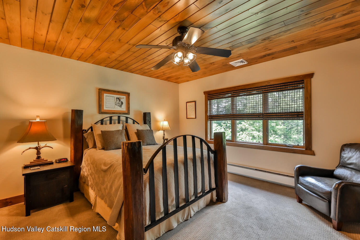 22 Club Road Windham, NY 12496 - Photo 22 of 41 a view of a livingroom with furniture and chandelier fan