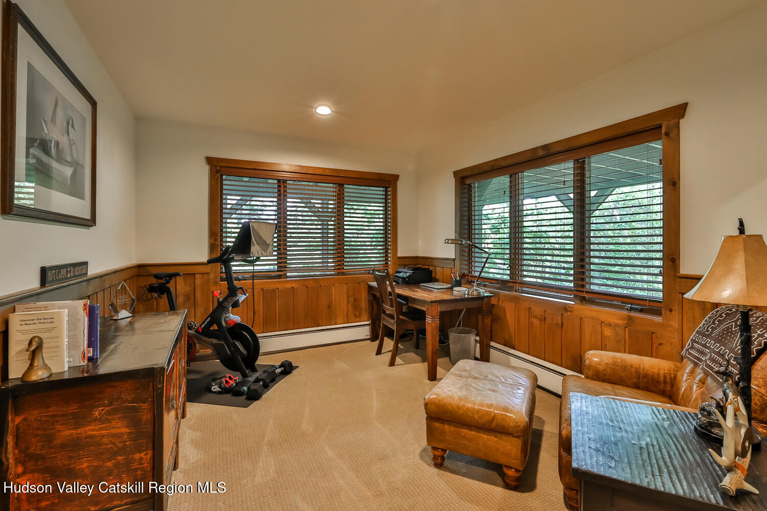 22 Club Road Windham, NY 12496 - Photo 33 of 41 a view of a livingroom with workspace and a couch