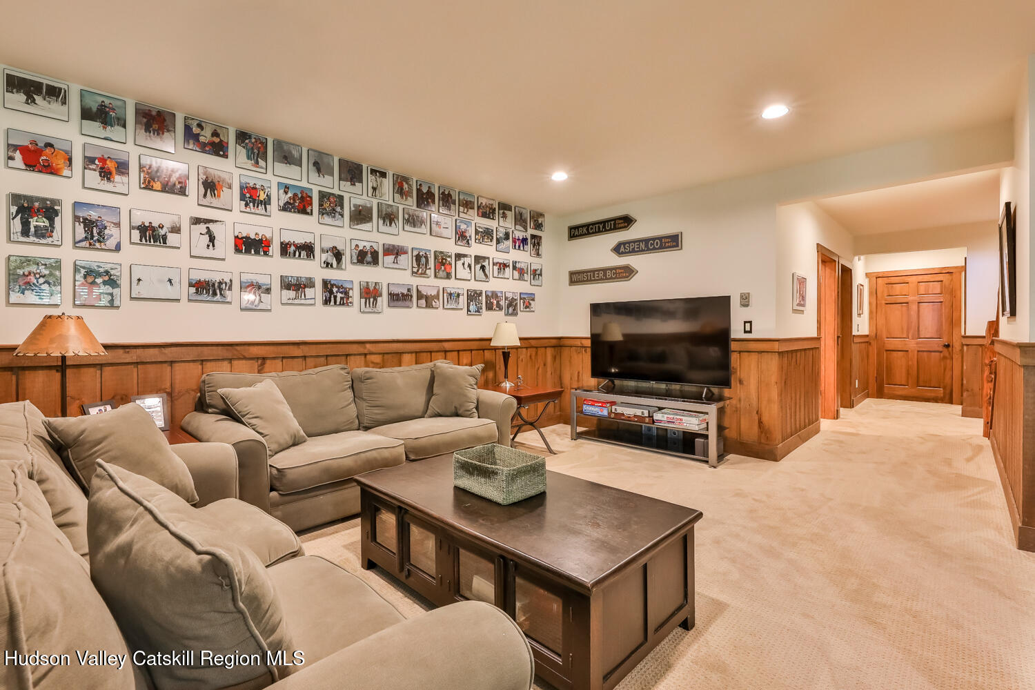 22 Club Road Windham, NY 12496 - Photo 34 of 41 a living room with furniture and a flat screen tv