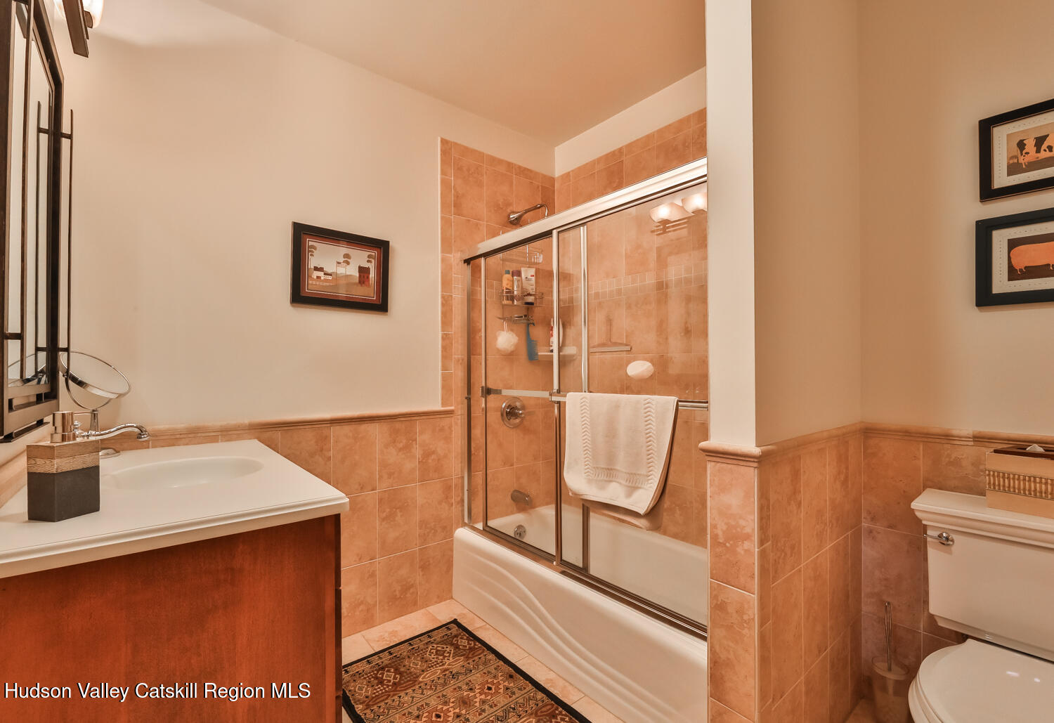 22 Club Road Windham, NY 12496 - Photo 36 of 41 a bathroom with a sink and a mirror