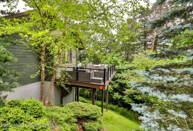 a view of a bench in a garden