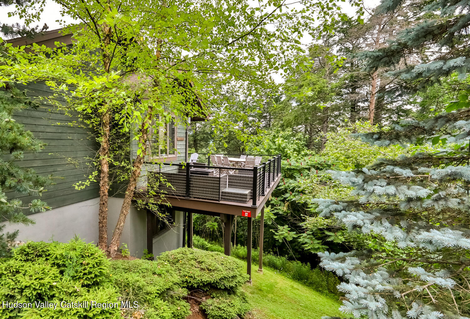 22 Club Road Windham, NY 12496 - Photo 4 of 41 a view of a bench in a garden