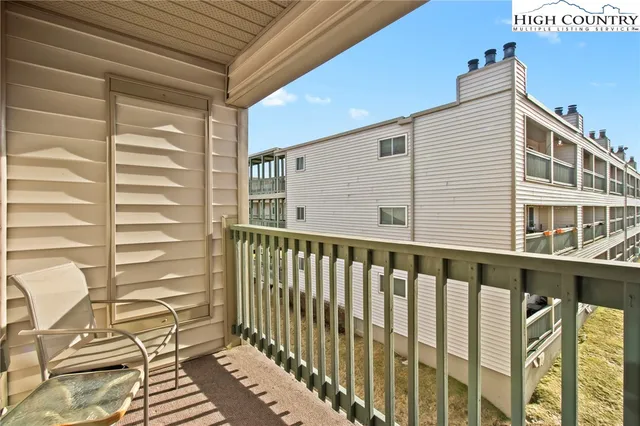 a view of a house with roof deck