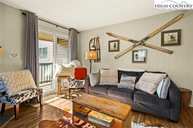 a living room with furniture or couch and a window