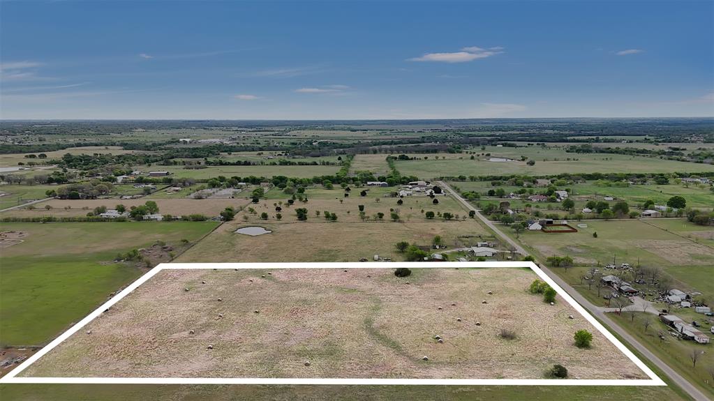 6123 Hill Court Rio Vista, TX 76093 - Photo 4 of 14 a view of a swimming pool with a lake view