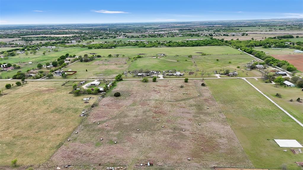 6123 Hill Court Rio Vista, TX 76093 - Photo 9 of 14 an aerial view of a houses with a yard