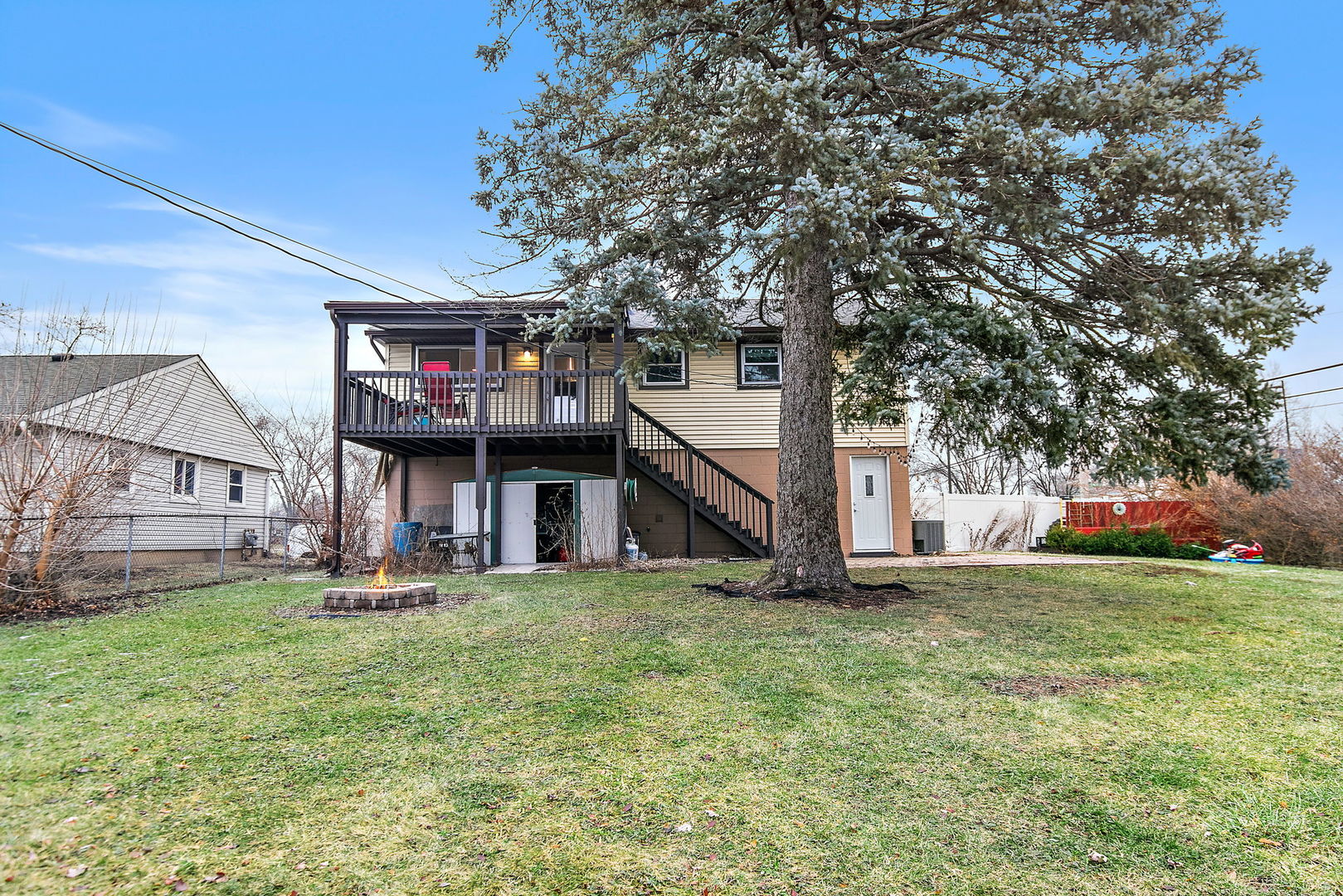 1014 Vine Street Streamwood, IL 60107 - Photo 23 of 23 a view of a house with a yard