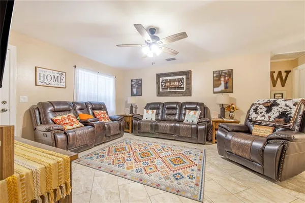 a living room with furniture and a couch