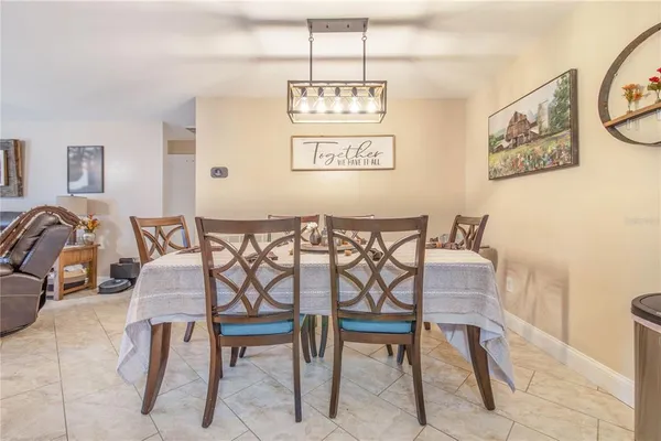 a view of a dining room with furniture
