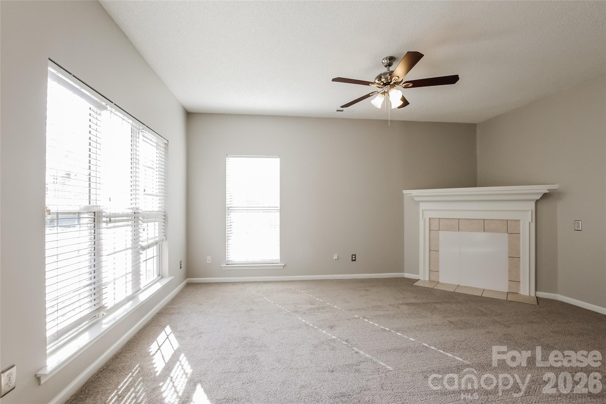 10802 Gold Pan Road Charlotte, NC 28215 - Photo 7 of 15 a view of an empty room with a window